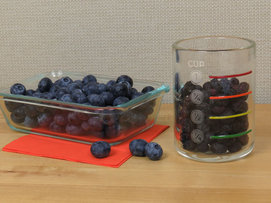 Whole blueberries in measuring cup Whole blueberries in measuring cup